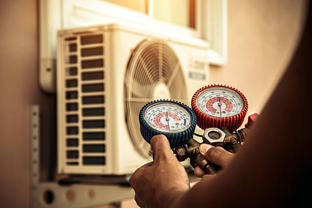 Professional Air Conditioning Service technician working in Highlands, NC
